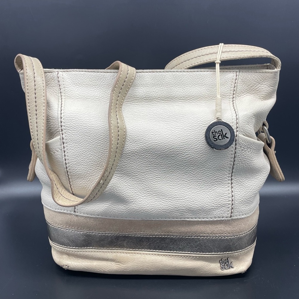 The Sak Cream and Tan Leather Crossbody Bag with Gold and Glitter Accents